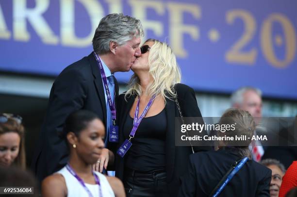 Executive Committee member John Delaney greets wife Emma English with a kiss during the UEFA Women's Champions League Final match between Lyon and...