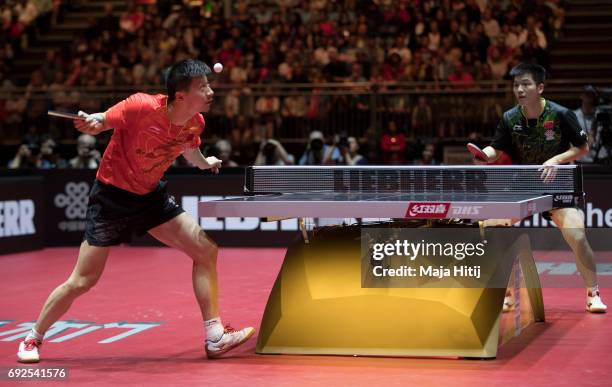 Ma Long of China in action against Zhendong Fan of China during Men's Singles Final at Table Tennis World Championship at Messe Duesseldorf on June...