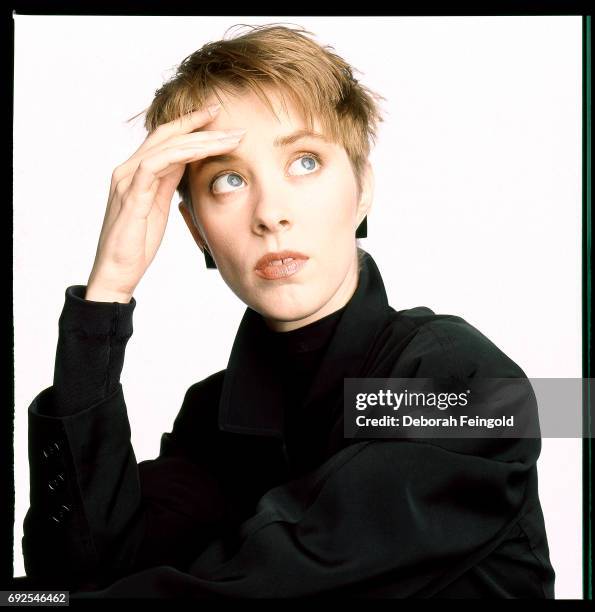 Deborah Feingold/Corbis via Getty Images) NEW YORK Singer and songwriter Suzanne Vega poses for a portrait in 1987 in New York City, New York.