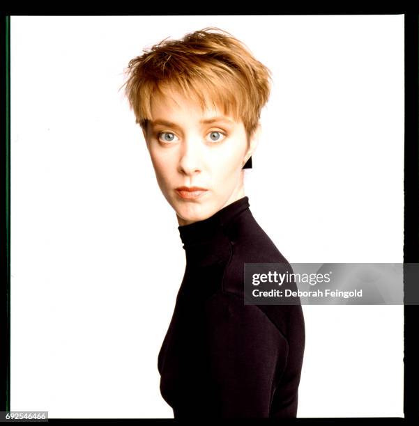 Deborah Feingold/Corbis via Getty Images) NEW YORK Singer and songwriter Suzanne Vega poses for a portrait in 1987 in New York City, New York.