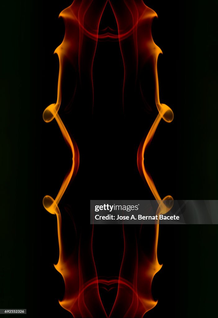 Full frame of forms and figures of smoke of color orange in ascending movement  on a black background