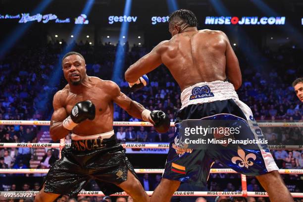 Jean Pascal defends himself against Eleider Alvarez during the WBC light heavyweight silver championship match at the Bell Centre on June 3, 2017 in...