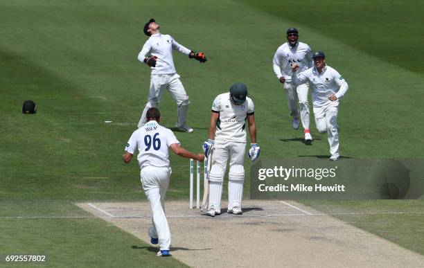 David Wiese of Sussex celebrates with team mates Harry Finch and Chris Jordan after dismissing Ross Whiteley, caught behind by Michael Burgess,...