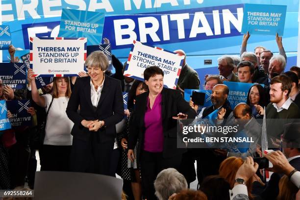 British Prime Minister Theresa May and Scottish Conservative and Unionist Party leader Ruth Davidson speak during a general election campaign visit...