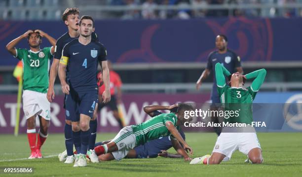 Eduardo Aguirre, Joaquin Esquivel and Edson Alvarez of Mexico react after a chance to score is missed during the FIFA U-20 World Cup Korea Republic...