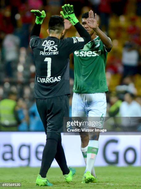 Camilo Vargas goalkeeper of Deportivo Cali celebrates with teammate Jeison Angulo after a goal scored by Nicolas Benedetti during a match between...