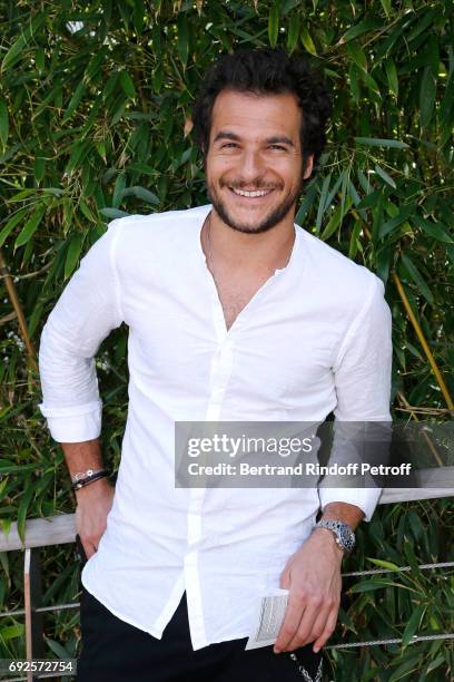 Singer Amir Haddad attends the 2017 French Tennis Open - Day Height at Roland Garros on June 4, 2017 in Paris, France.