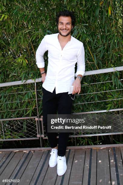 Singer Amir Haddad attends the 2017 French Tennis Open - Day Height at Roland Garros on June 4, 2017 in Paris, France.