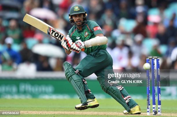 Bangladesh's Mehedi Hasan Miraz plays a shot during the ICC Champions Trophy match between Australia and Bangladesh at The Oval in London on June 5,...