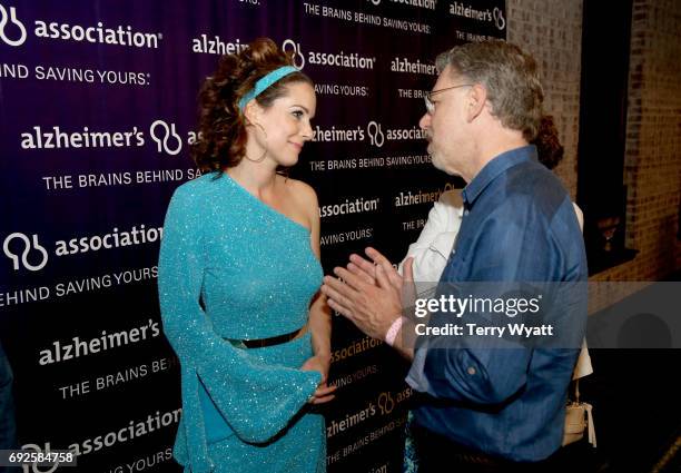 Kimberly Williams Paisley and Alzheimer's Association President & CEO Harry Johns speak during the Nashville Disco Party Benefiting Alzheimer's...