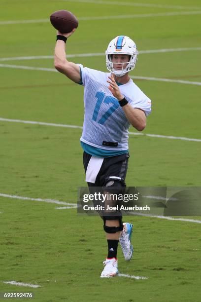 Ryan Tannehill of the Miami Dolphins throws the ball during the teams OTA's on June 5, 2017 at the Miami Dolphins training facility in Davie, Florida.