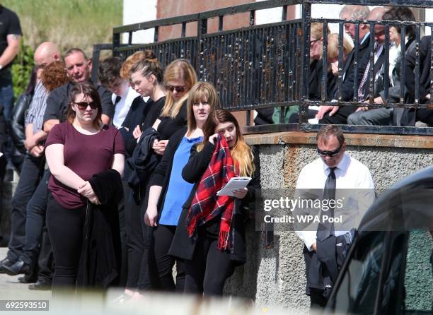 Mourners gather in the square to listen to the funeral of Manchester bomb victim Eilidh MacLeod during the service at Church of Our Lady, Star of the...