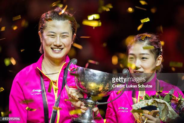 Ding Ning and Liu Shiwen of China celebrate with the trophy after winning the Women's Doubles Final match during the Table Tennis World Championship...