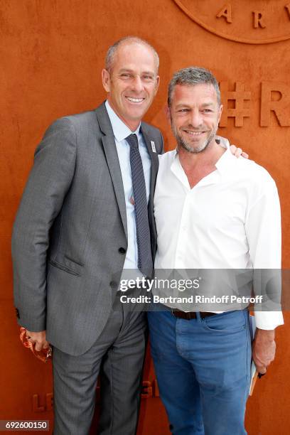 Director of Roland Garros tournament, Guy Forget and CEO of Courreges Jacques Bungert attend the 2017 French Tennis Open - Day Height at Roland...