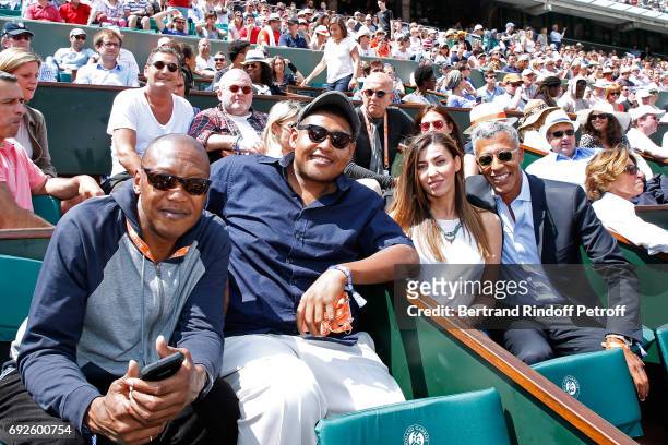 Actor Omar Benson Miller and his brother with Journalist Rachid M'Barki and his companion Bouchra attend the 2017 French Tennis Open - Day Height at...