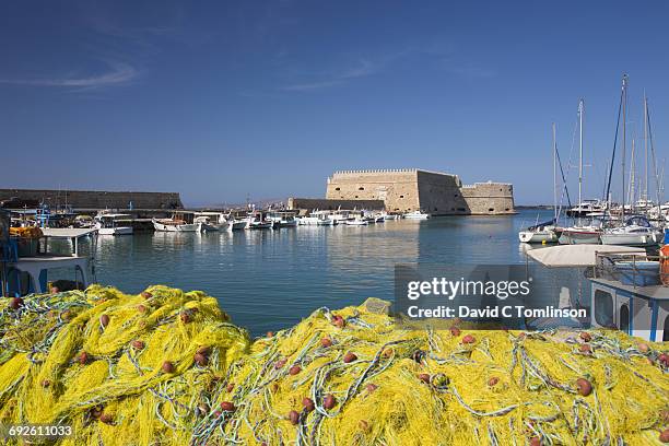view across the venetian harbour, iraklio, crete - herakleion stockfoto's en -beelden