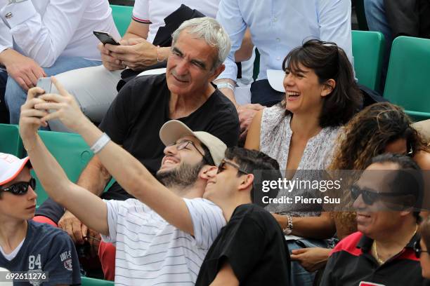 Raymond Domenech and Estelle Denis are spotted at Roland Garros on June 5, 2017 in Paris, France.