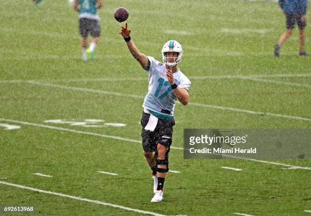 Miami Dolphins quarterback Ryan Tannehill throws the ball during a passing drill at OTAs on Monday, June 5, 2017 at the Miami Dolphins training...