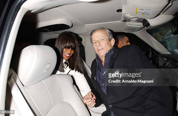 Model Naomi Campbell and photographer Peter Beard leave a restaurant after having lunch January 10, 2002 in New York City.
