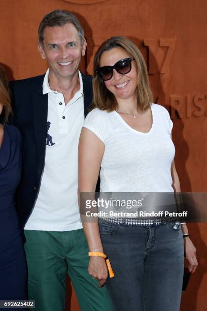 Host Sandrine Quetier and guest attend the 2017 French Tennis Open - Day Height at Roland Garros on June 4, 2017 in Paris, France.