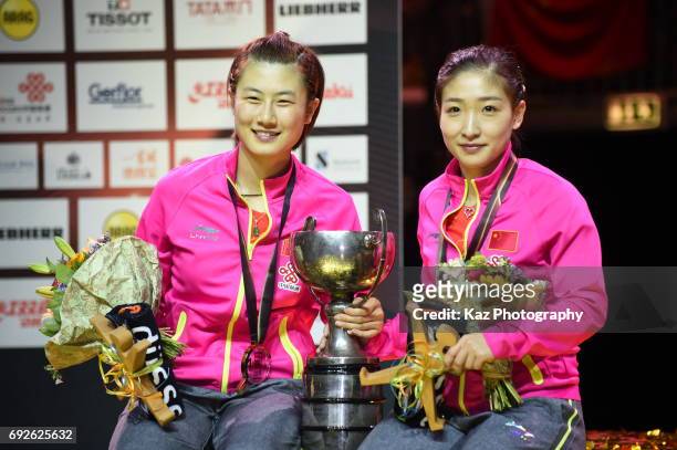 Ding Ning and Liu Shiwen of China hold the cup as they won Women's Doubles during the the Table Tennis World Championship at Messe Duesseldorf on...