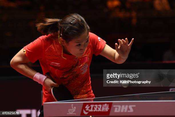 Liu Shiwen of China returns the ball during the the Table Tennis World Championship women's Final between Ding Ning/Liu Shiwen of China and Chen...
