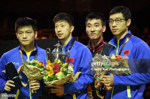 From the left, Fan Zhendong of China, Ma Long of China, Lee Sangsu of Korea republic and Xu Xin of China for the memorial photograph during the Table...