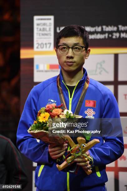 Xu Xin of China wins the bronze medal in the Men's Single during the Table Tennis World Championship at Messe Duesseldorf on June 5, 2017 in...