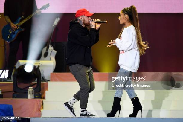 Free for editorial use. In this handout provided by 'One Love Manchester' benefit concert Mac Miller and Ariana Grande perform on stage on June 4,...