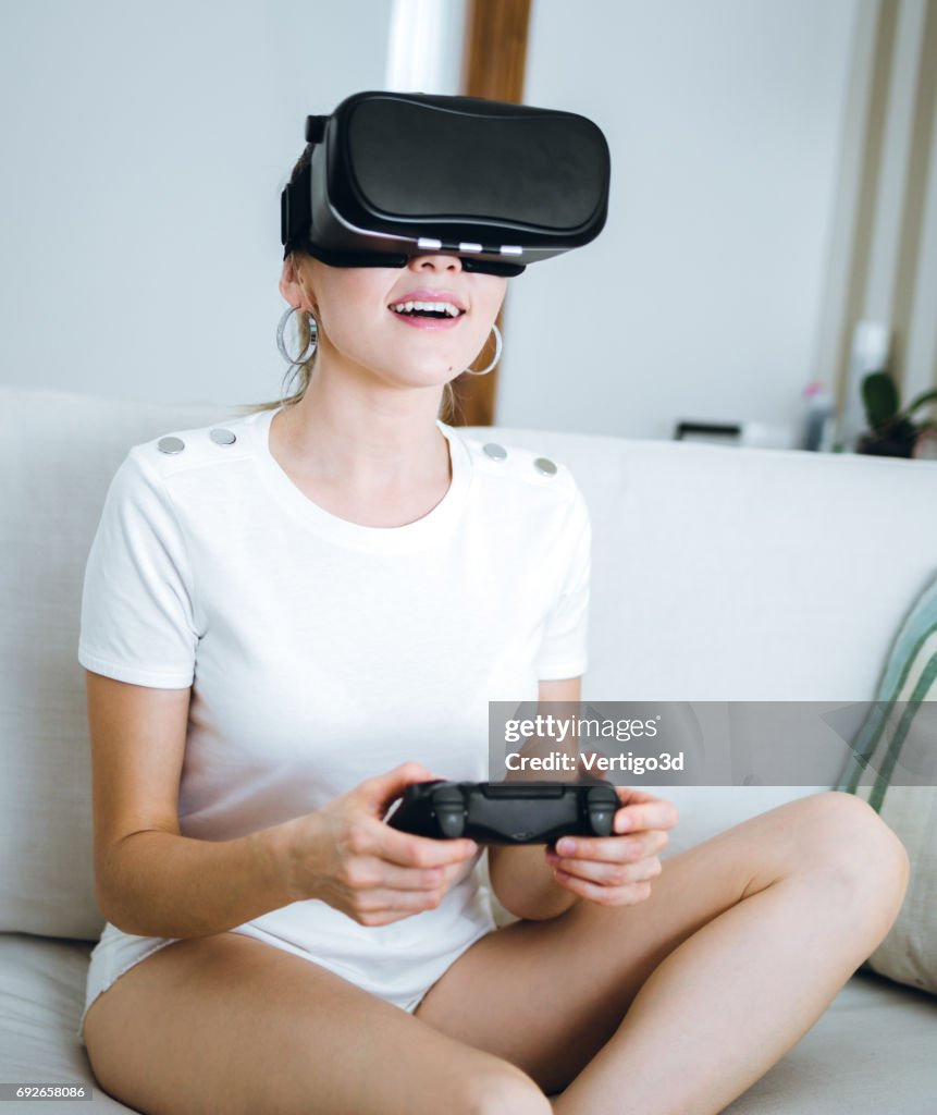 Women testing Virtual Reality simulator at home