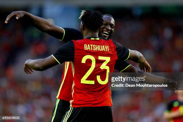 Michy Batshuayi of Belgium celebrates scoring his teams first goal of the game with team mate Romelu Lukaku during the International Friendly match...