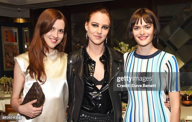 Wonderland editor Chloe Stevens, Eliza Cummings and Sam Rollinson attend the Wonderland Summer Issue dinner hosted by Madison Beer at The Ivy Soho...