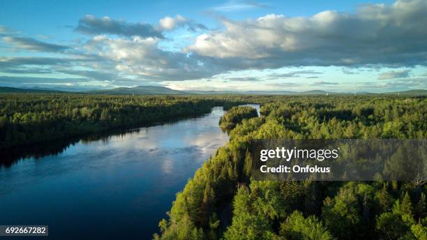 aerial nature landscape flying over river at sunset - quebec landscape stock pictures, royalty-free photos & images