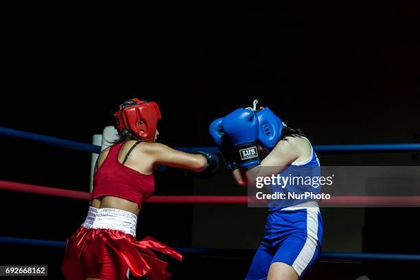 Osorno, Chile. 2 June 2017. Kim Sandoval exchanges punches with Tamara Mancilla during the boxing match at Club Mexico. In Osorno, Chile