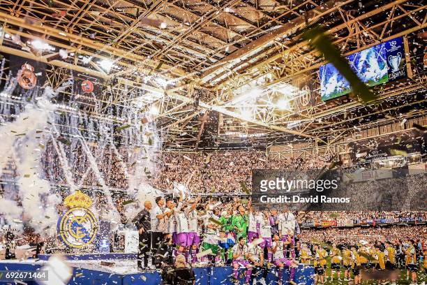 Real Madrid CF players celebrate with the trophy after the UEFA Champions League Final between Juventus and Real Madrid at National Stadium of Wales...