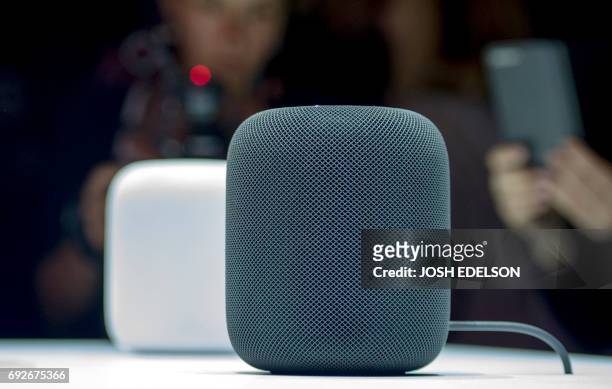 New Apple HomePod smart speaker are on display during Apple's Worldwide Developers Conference in San Jose, California, on June 05, 2017. / AFP PHOTO...