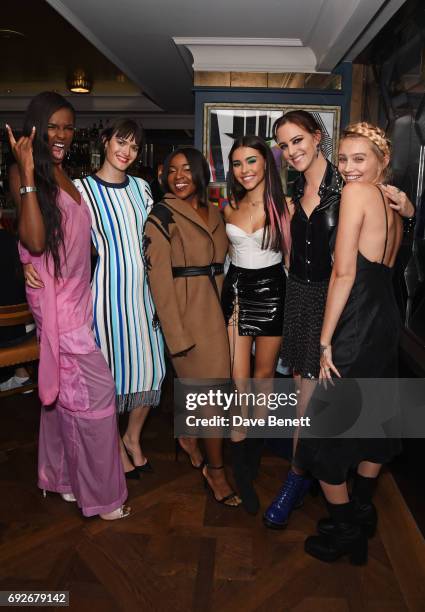 Leomie Anderson, Sam Rollinson, Ray BLK, Madison Beer, Eliza Cummings and Cailin Russo attend the Wonderland Summer Issue dinner hosted by Madison...