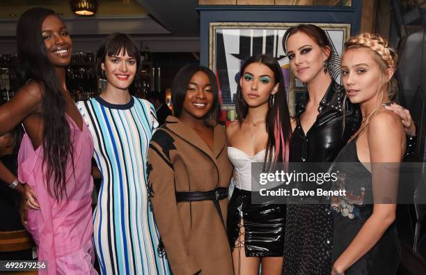 Leomie Anderson, Sam Rollinson, Ray BLK, Madison Beer, Eliza Cummings and Cailin Russo attend the Wonderland Summer Issue dinner hosted by Madison...