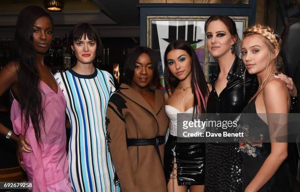 Leomie Anderson, Sam Rollinson, Ray BLK, Madison Beer, Eliza Cummings and Cailin Russo attend the Wonderland Summer Issue dinner hosted by Madison...