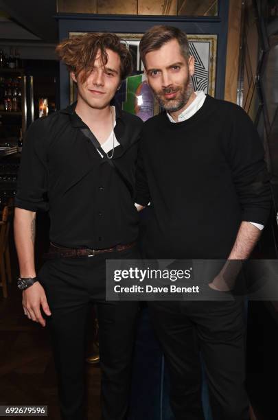 Brooklyn Beckham and Huw Gwyther attend the Wonderland Summer Issue dinner hosted by Madison Beer at The Ivy Soho Brasserie on June 5, 2017 in...