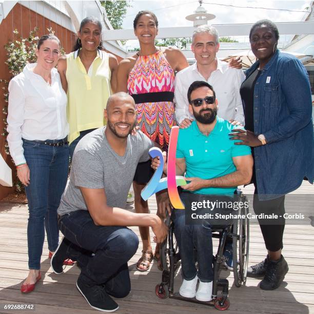 2nd row: Karateka Laurence Fisher, Athlete Marie-Jose Perec, Basket-Ball Player Emmeline Ndongue, Table Tennis Player Jean-Philippe Gatien, Gwladys...