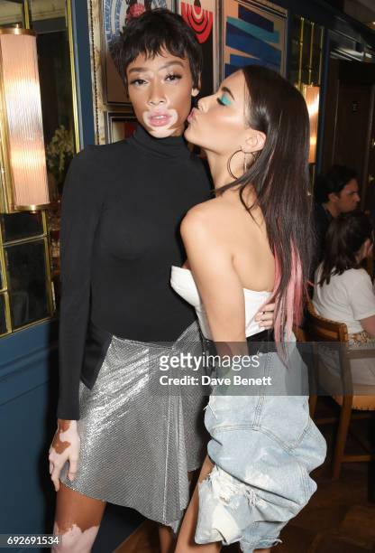 Winnie Harlow and Madison Beer attend the Wonderland Summer Issue dinner hosted by Madison Beer at The Ivy Soho Brasserie on June 5, 2017 in London,...
