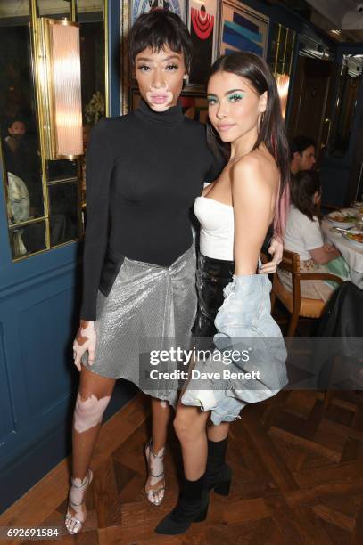 Winnie Harlow and Madison Beer attend the Wonderland Summer Issue dinner hosted by Madison Beer at The Ivy Soho Brasserie on June 5, 2017 in London,...