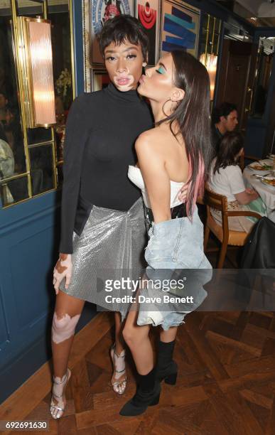 Winnie Harlow and Madison Beer attend the Wonderland Summer Issue dinner hosted by Madison Beer at The Ivy Soho Brasserie on June 5, 2017 in London,...