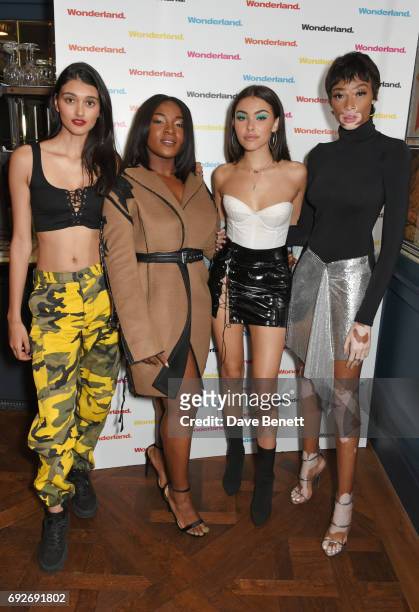 Neelam Gill, Ray BLK, Madison Beer and Winnie Harlow attend the Wonderland Summer Issue dinner hosted by Madison Beer at The Ivy Soho Brasserie on...
