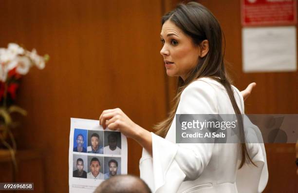 Meghan Blanco, attorney for Ezeoma Chigozie Obioha, who was convicted of 1st degree murder in the killing of 30-year-old Carrie Jean Melvin holds a...