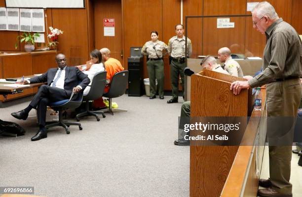 Bernard Melvin, right, gives his victim impact statement for the court in the sentencing hearing for Ezeoma Chigozie Obioha, who was convicted of 1st...