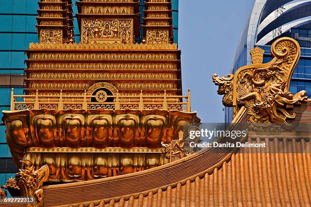 golden dragons on roof of jingan temple, shanghai, china - nanjing road stock pictures, royalty-free photos & images