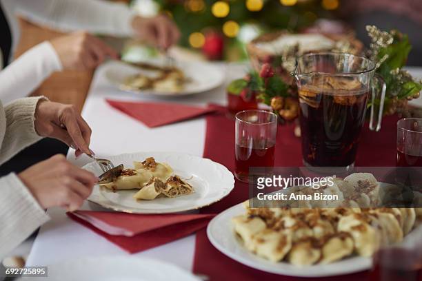 eating dumplings with the family. debica, poland - anna of poland stock pictures, royalty-free photos & images