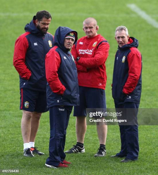 The Lions coach teaming of Andy Farrell, defence coach, Warren Gatland, head coach, Graham Rowntree, scrum coach and Rob Howley backs coach look on...